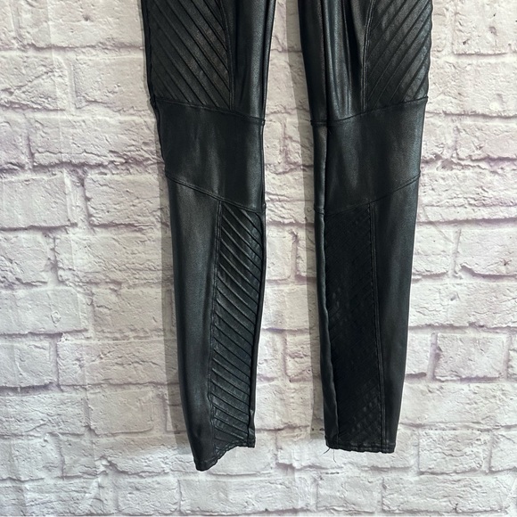 This is a pair of black Spanx Faux Leather Moto Leggings. - Picture 15 of 16